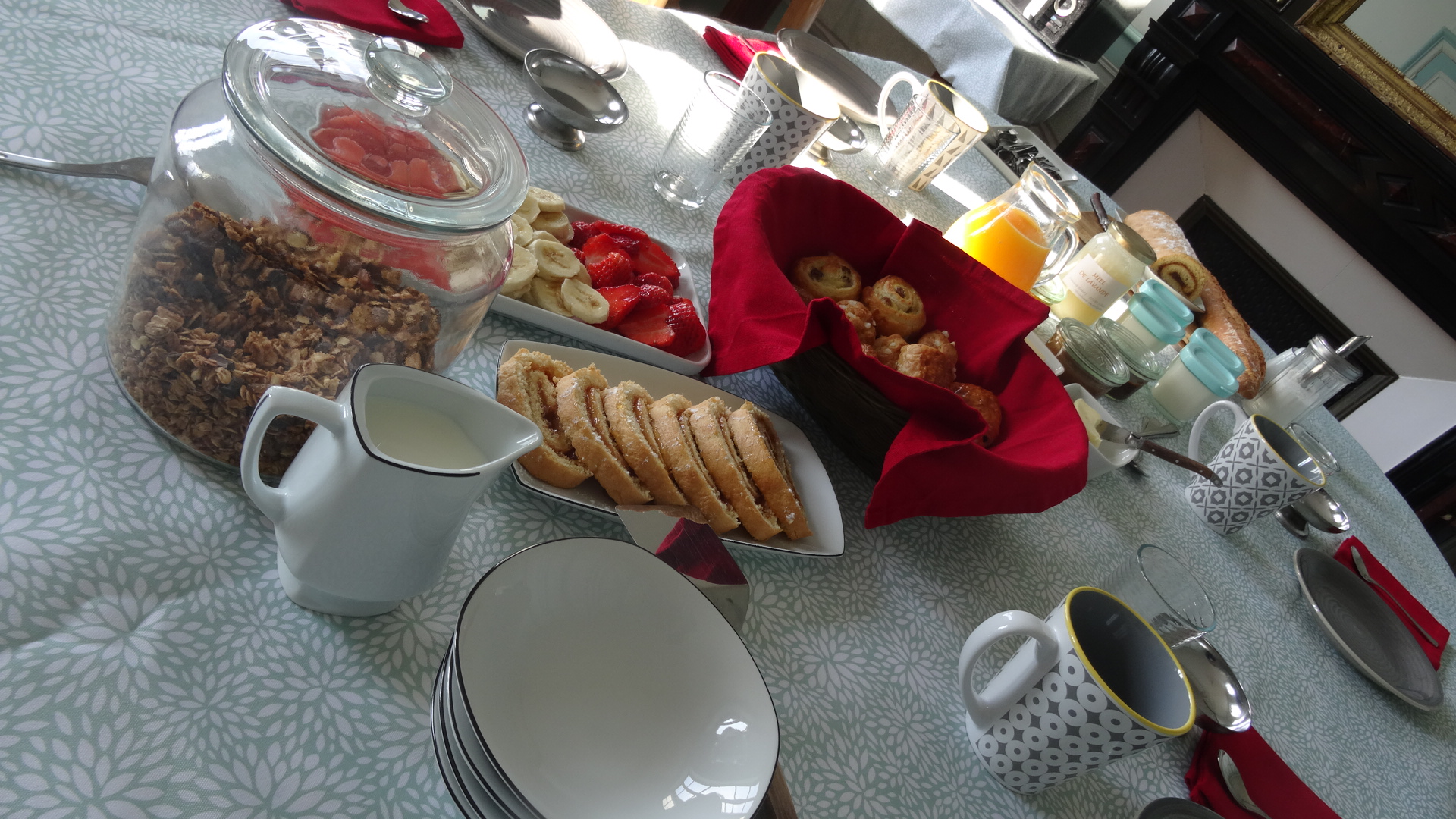 Breakfast with pastries, granola fruits and cakes